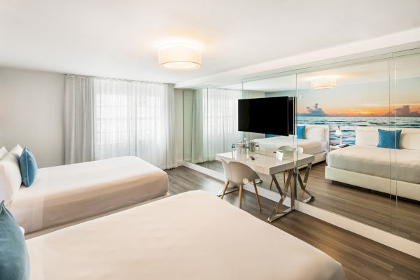 A modern hotel room with two beds, a large mirror, TV, and a scenic photo on the wall. The room is bright and stylishly decorated.