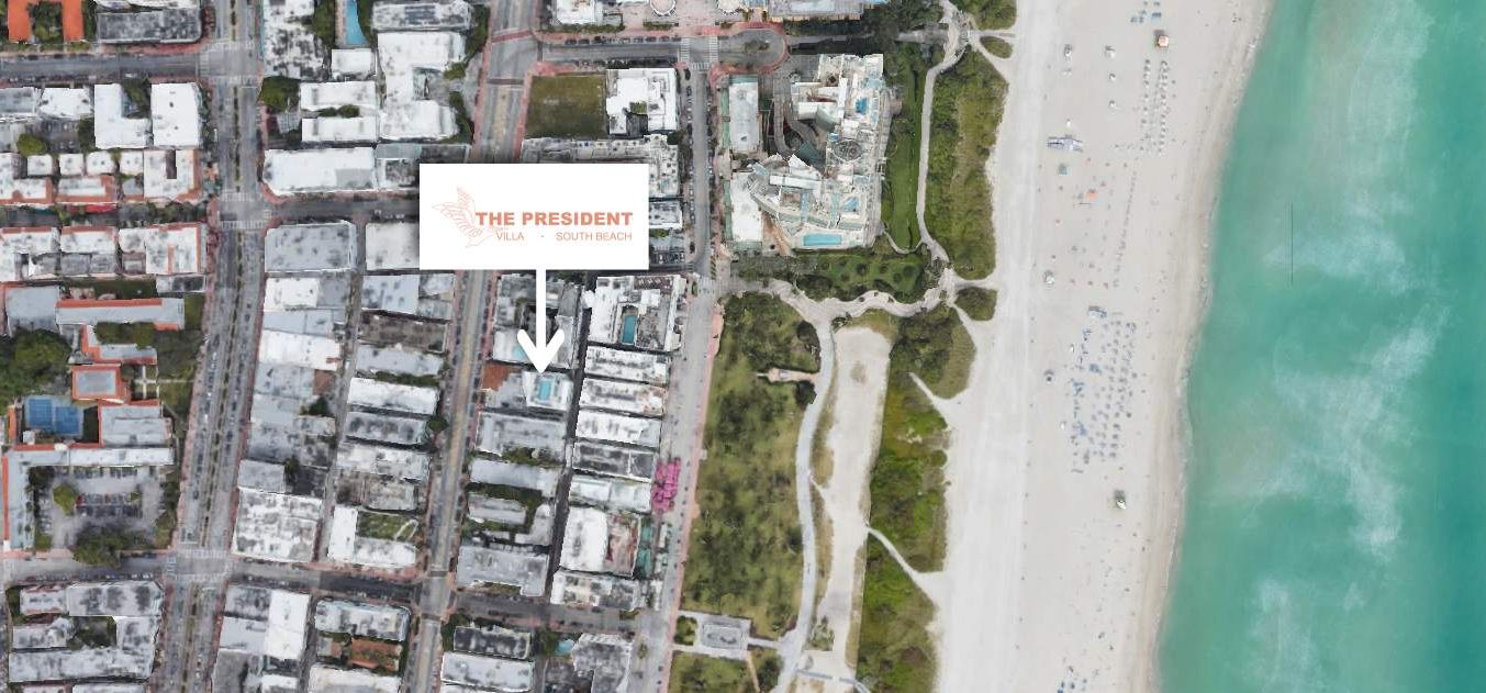 Satellite view showing urban area with a hotel labeled "The President," adjacent to a beach and coastline.